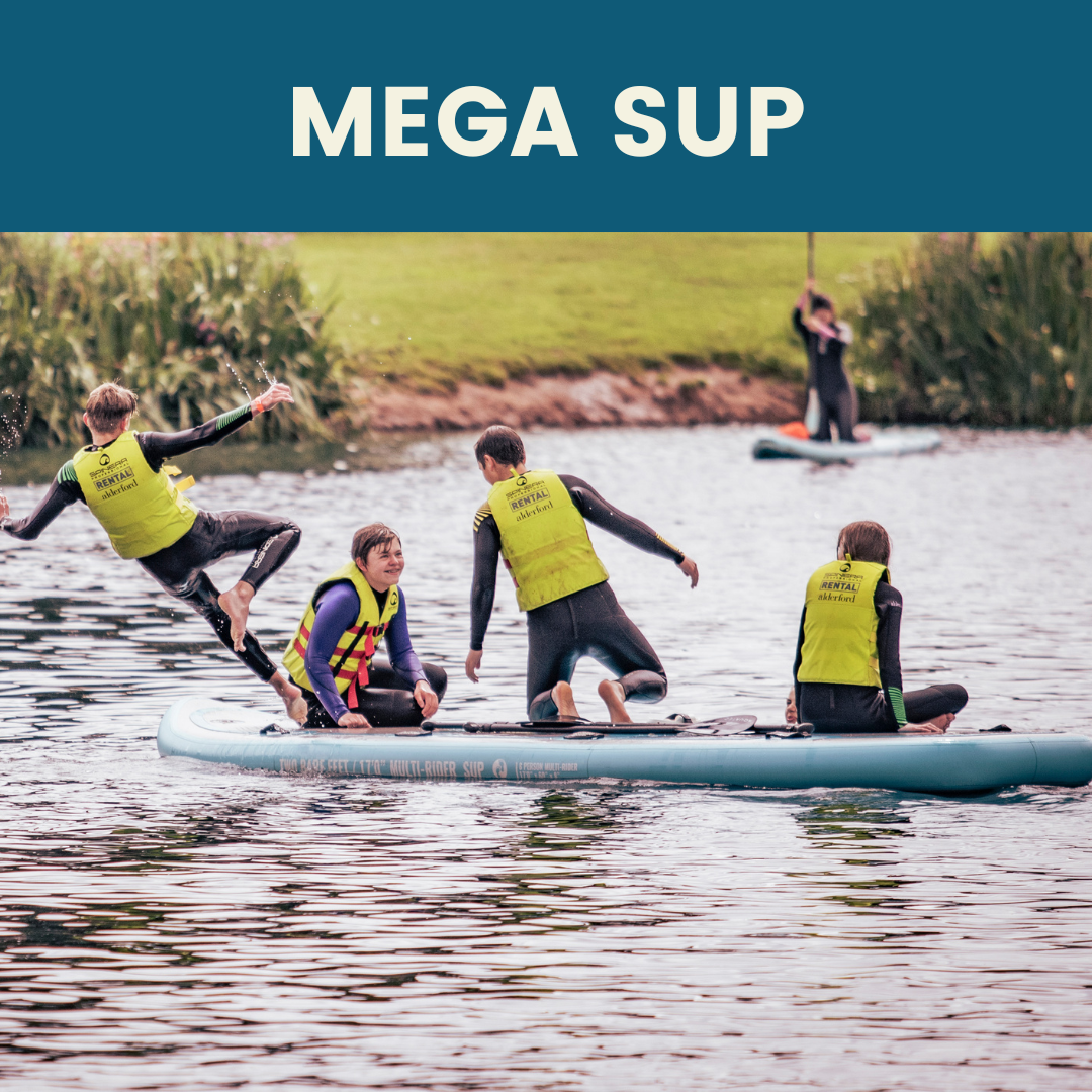 Children jumping from giant paddleboard